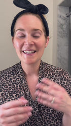 Woman applying Vinchella ThermoGlow Serum ProPeptidic for smoother-looking skin and reduced appearance of expression lines.